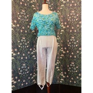 Lurex stirrup pants in silver, disco style